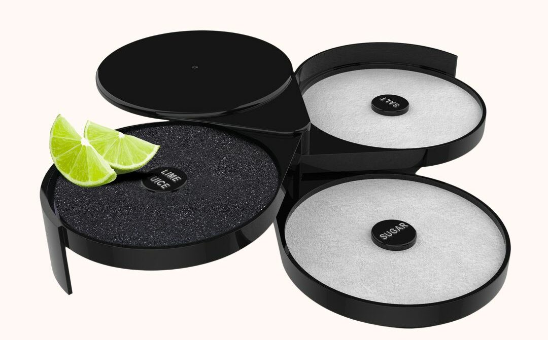 Bartender pouring multiple drinks quickly using ScreenPourer spouts during service